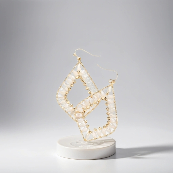 Creme Petal Paradise: Bead-Embellished Dangle Earrings - Picture 3 of 3